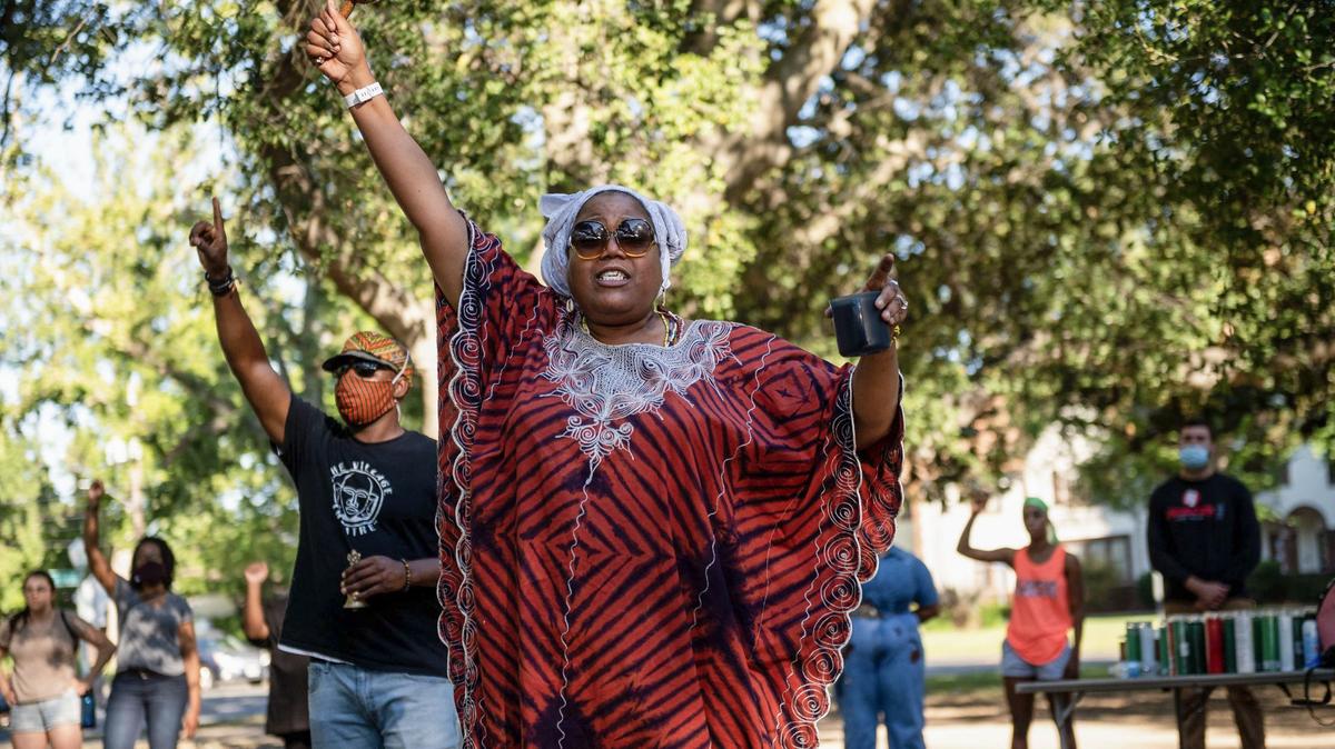Rolanda Wilkins, of Earth Mama Healing, opens up Black Justice Sacramento’s healing space event at Curtis Park on June 9, 2020, in Sacramento. The Democratic Party of Sacramento requested local officeholders rescind their endorsement of Wilkins, a candidate for the Sacramento City Unified School District board.