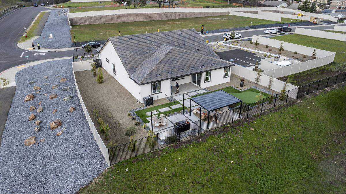 A model home in Cameron Park features defensible space with fire-resistant materials in Northern California’s first Wildfire Prepared Neighborhood, as designated by the Insurance Institute for Business and Home Safety, on Wednesday. The development is being built by Los Angeles-based KB Home.