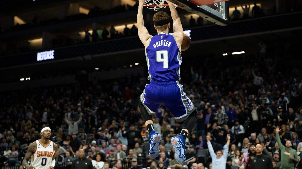 Sacramento Kings guard Kevin Huerter (9) scores after he steals the ball from Phoenix Suns forward Mikal Bridges (25) in the fourth quarter during a game at the Golden 1 Center on Monday.