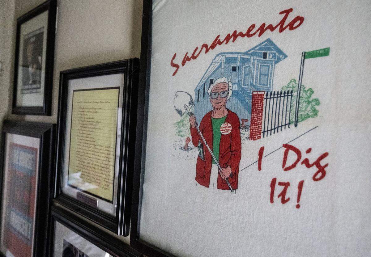 A framed “Sacramento – I dig it!” T-shirt depicting notorious Sacramento serial killer Dorothea Puente hangs amid other memorabilia about the case on the wall of her former F Street home.