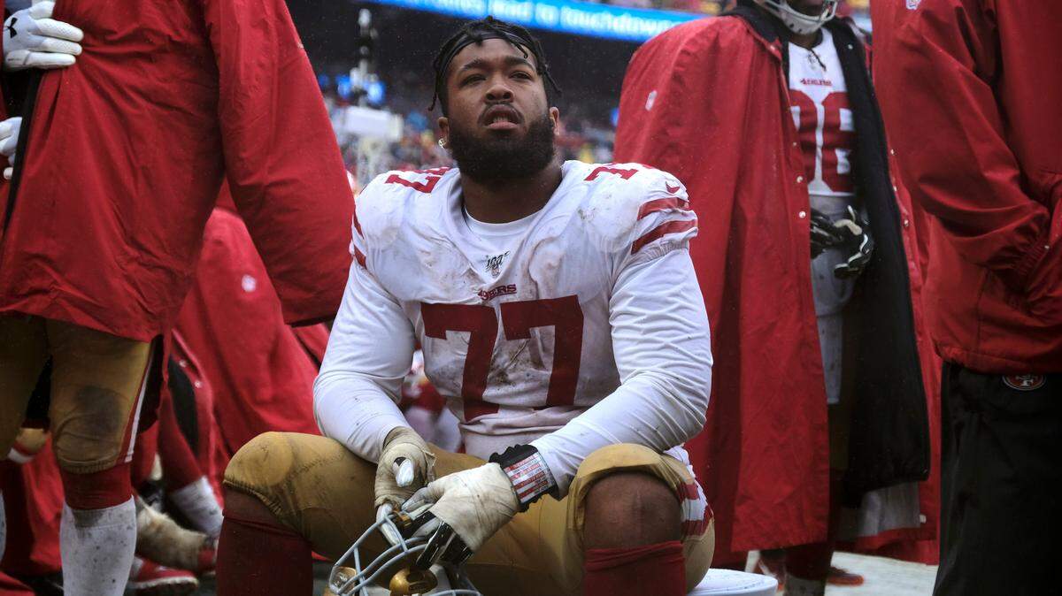 San Francisco 49ers defensive tackle Jullian Taylor (77) sits on the sideline in the second half of an NFL football game against the Washington Redskins, Sunday, Oct. 20, 2019, in Landover, Md. (AP Photo/Mark Tenally)