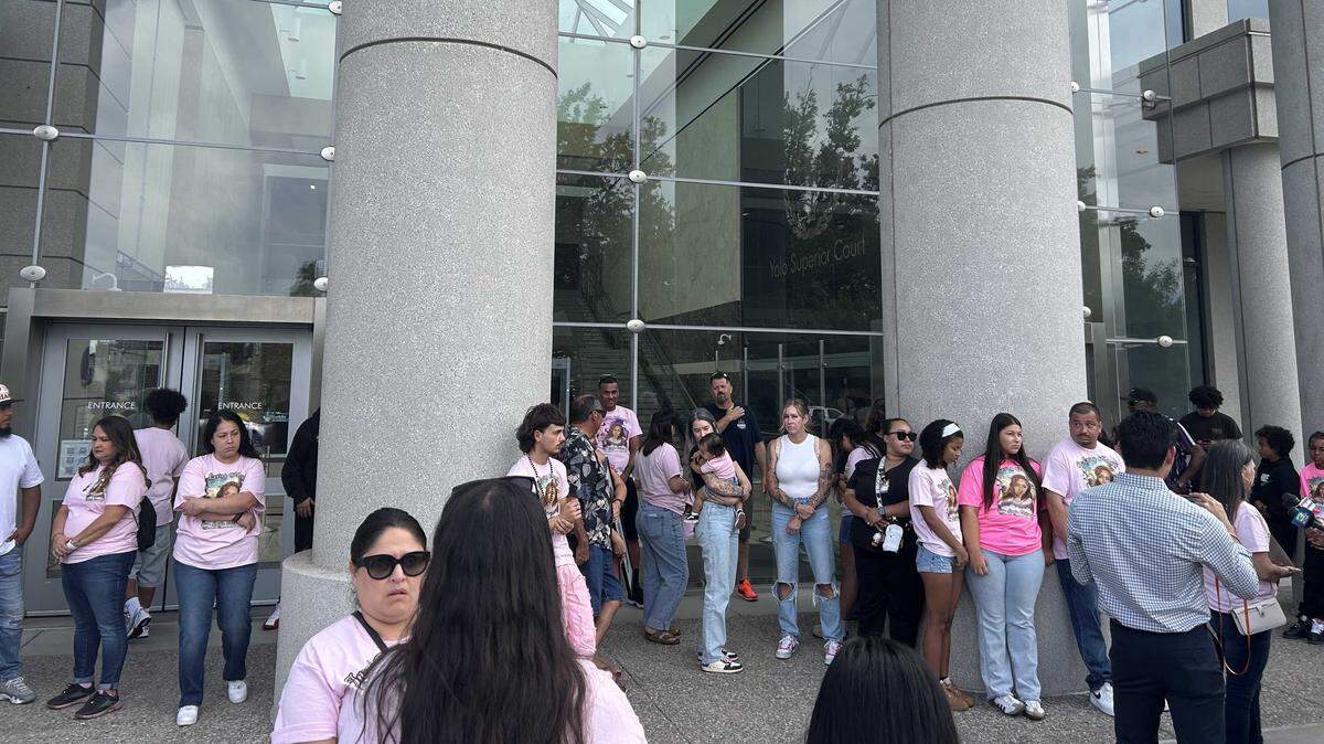 Relatives and friends of Layla Chrissa Clemons and Jaea Chatman gather outside the courthouse in Woodland on Wednesday. David Alison Walker, the 71-year-old man accused of crashing into the two 17-year-old girls in West Sacramento Saturday night, appeared in court.