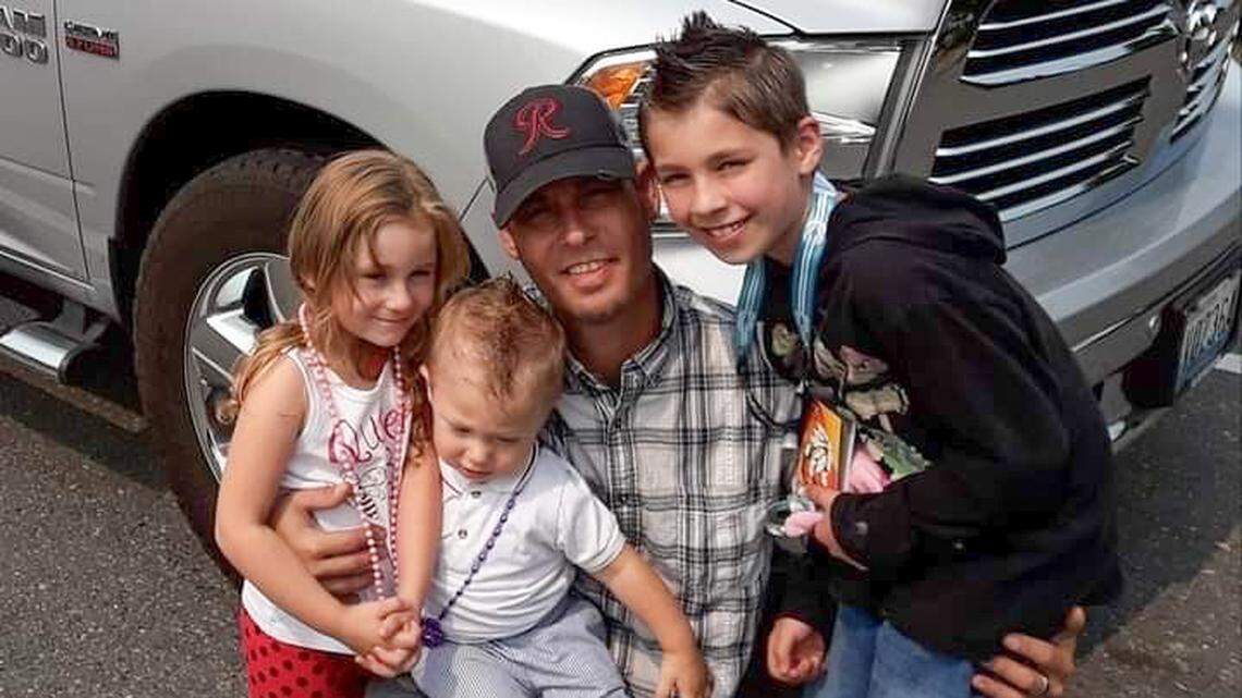 This provided photo shows William Yurek and three of his children.