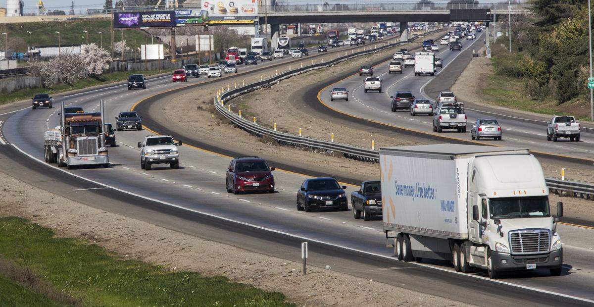 Semi trucks travel along Highway 99 through Stanislaus County Sunday, Feb 18th, 2018.