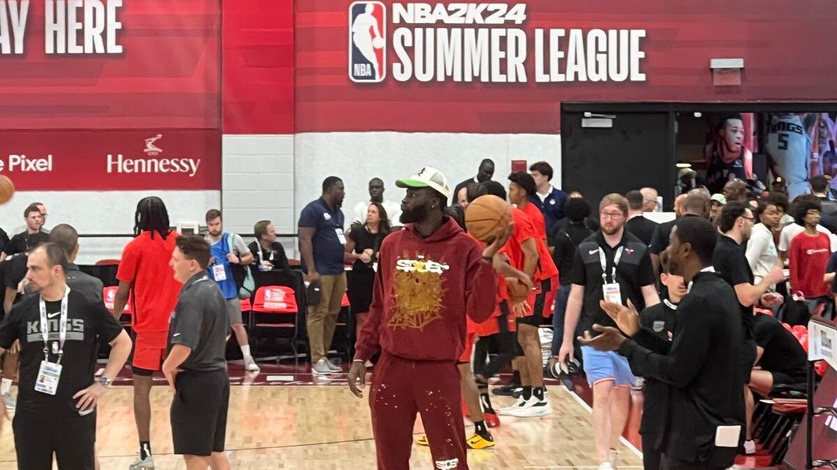 Sacramento Kings center Neemias Queta, center, will miss the rest of the Las Vegas Summer League after an MRI revealed a stress reaction and a metatarsal capsule sprain in his right foot.
