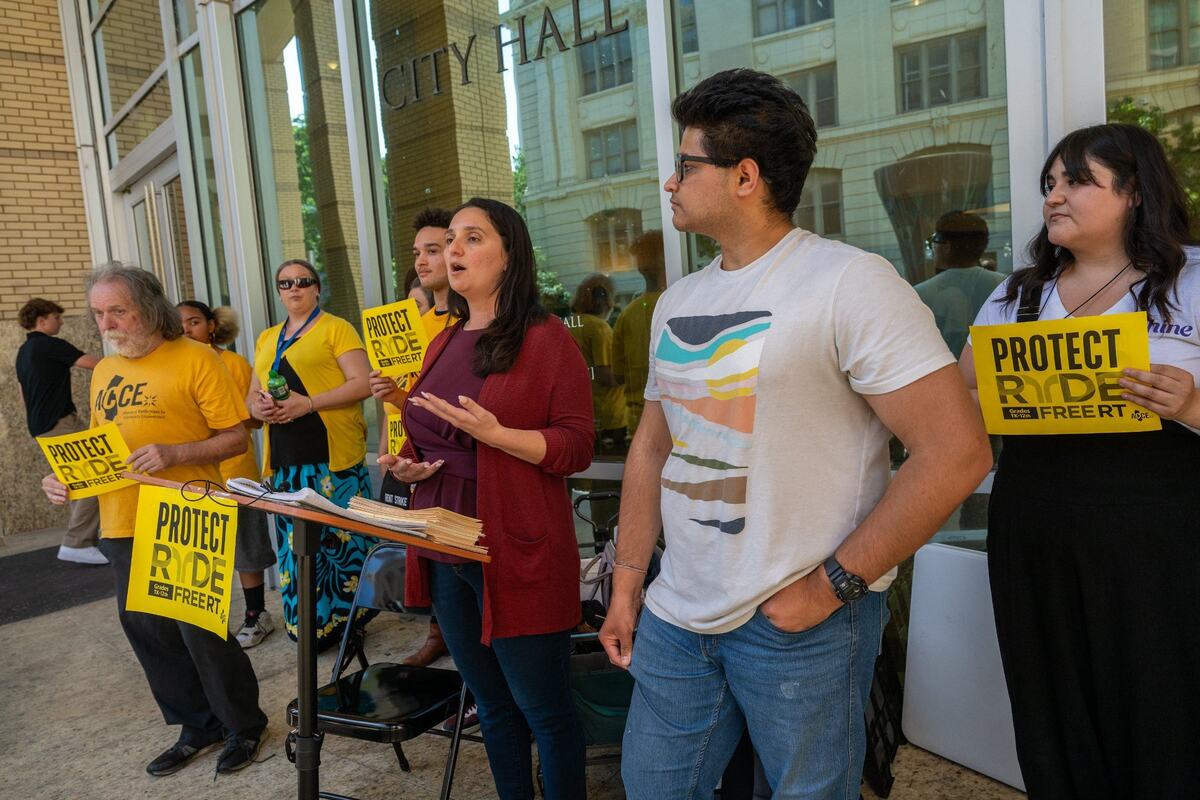 Vanessa Cudabac, a parent and a third grade teacher at Phoebe A. Hearst Elementary School, speaks at a press conference against the elimination of RydeFreeRT free fare program for K-12 youth outside Sacramento City Hall on Tuesday. “It also helps to improve equity within our city, our students who are most at risk,” said Cudabac.