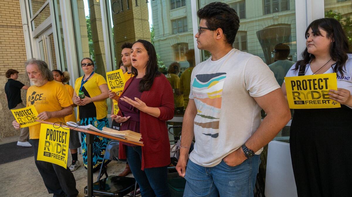 Vanessa Cudabac, a parent and a third grade teacher at Phoebe A. Hearst Elementary School, speaks at a press conference against the elimination of RydeFreeRT free fare program for K-12 youth outside Sacramento City Hall on Tuesday, May 21, 2024. “It also helps to improve equity within our city, our students who are most at risk,” said Cudabac.