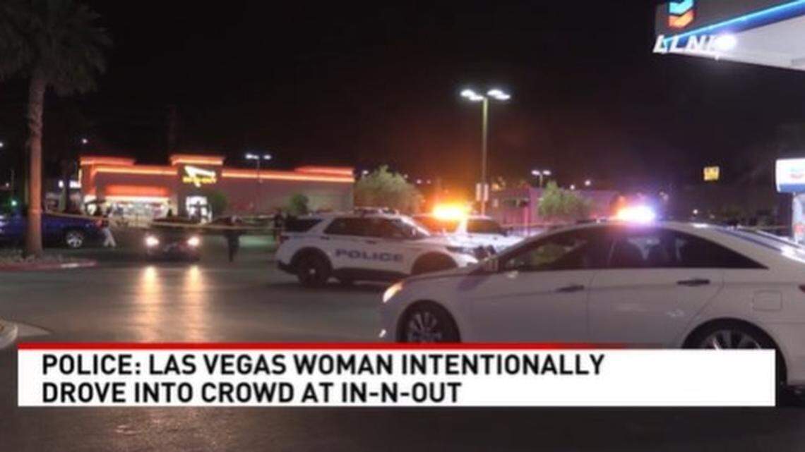 A 30-year-old woman faces charges that she drove through a crowd outside a North Las Vegas In-N-Out restaurant after a drive-thru dispute, Nevada police say.