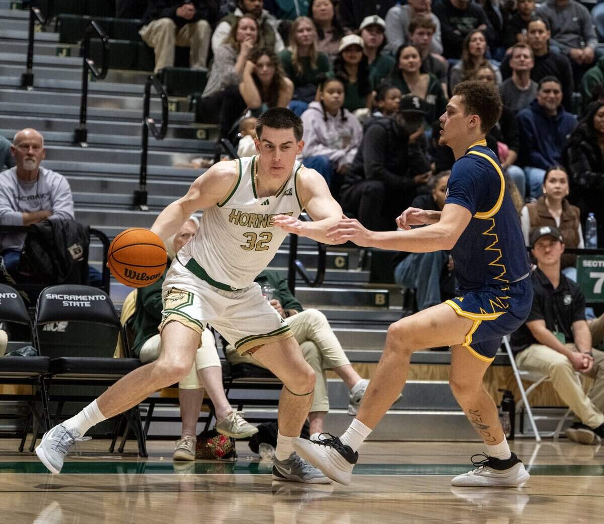 Sacramento State Hornets forward Mark Lavrenov (32) drives to the basket as Northern Arizona Lumberjacks forward Traivar Jackson (3) defends in the second half of a game on Jan. 15 in Sacramento.