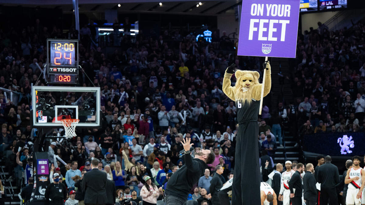 Slamson the Lion cheers on the crowd before the start of the fourth quarter during a game at Golden 1 Center in Sacramento, Thursday, Feb. 23, 2023.