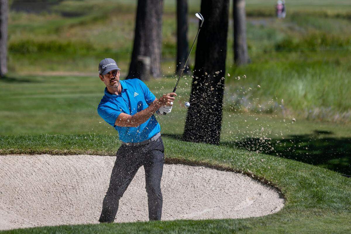 Green Bay Packers quarterback Aaron Rodgers hits a bunker shot on the sixth hole during the American Century Celebrity Golf Championship Tournament on Sunday, July 10, 2022, at Edgewood Tahoe Golf Course in Stateline, Nev.