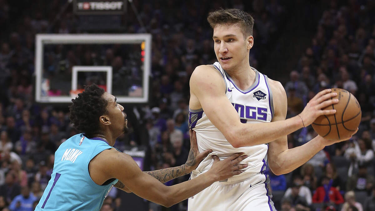 Kings guard Bogdan Bogdanovic, right, scored a team-high 22 points in a 104-97 victory Saturday in Sacramento.