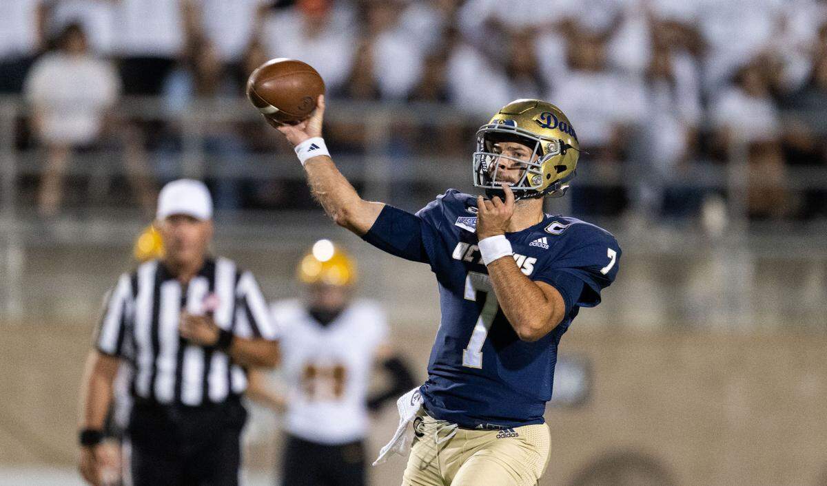 UC Davis Aggies quarterback Miles Hastings (7) thows a pass during a game against Idaho Vandals on Saturday at UC Davis Health Stadium.