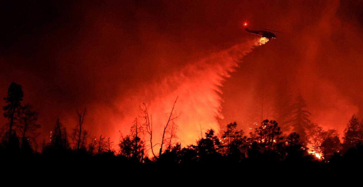 A Cal Fire Firehawk based out of the Hollister Air Attack base, is used to drop water in September on the Pickett Fire in Napa County.