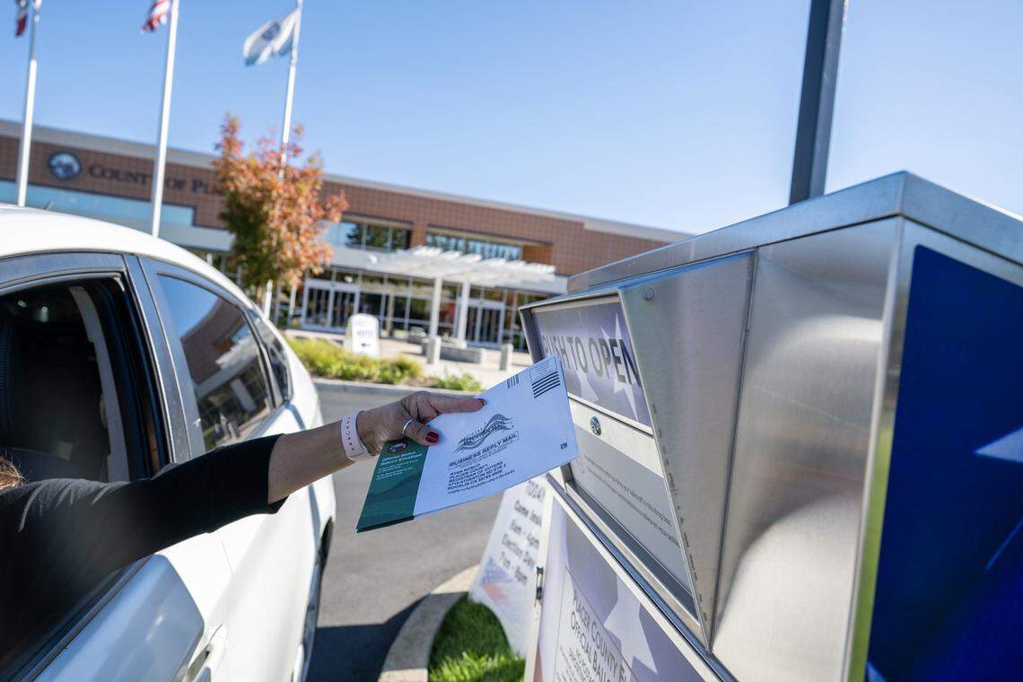 Ballots are deposited into the box outside the Placer County Clerk-Recorder-Elections Office in Rocklin on Tuesday, Oct. 28, 2025.