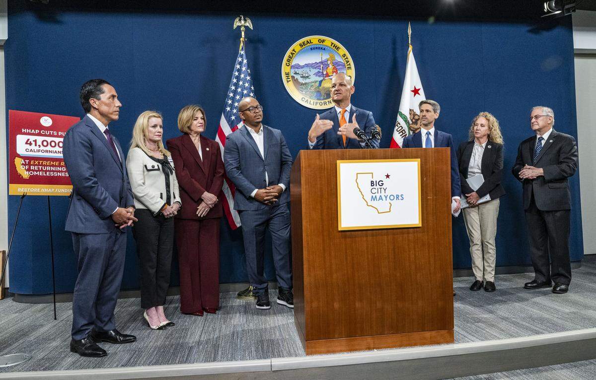 Sacramento Mayor Kevin McCarty speaks on Wednesday about the progress the city had building shelters for the homeless, during a news conference with other mayors of California's biggest cities to advocate for more money for a state homelessness program.