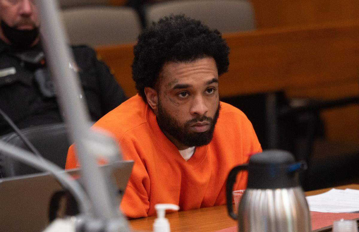 Murder suspect Mtula Payton, 29, listens to a witness in Sacramento Superior Court on Friday, Jan. 19, 2024, during a preliminary hearing with two other suspects in the April 2022 downtown Sacramento mass shooting.