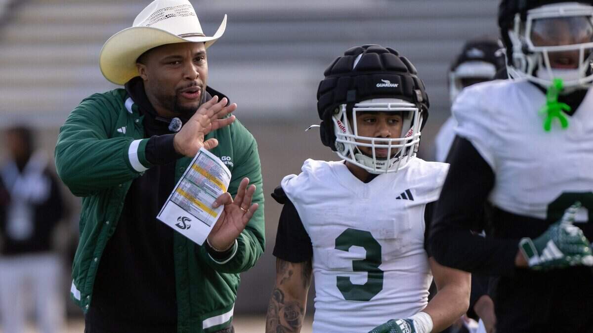 Sacramento State football coach Brennan Marion leads the team during the first day spring practice on campus on Monday, March 17, 2025.
