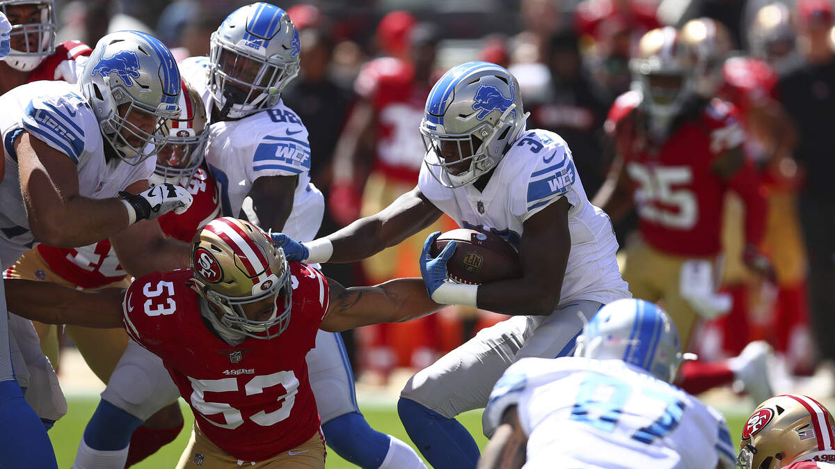 49ers outside linebacker Mark Nzeocha (53) is crowded by Detroit Lions players during a game Sept. 16 at Levi’s Stadium. Nzeocha leads all NFC special teams players in Pro Bowl votes as of Wednesday’s count.