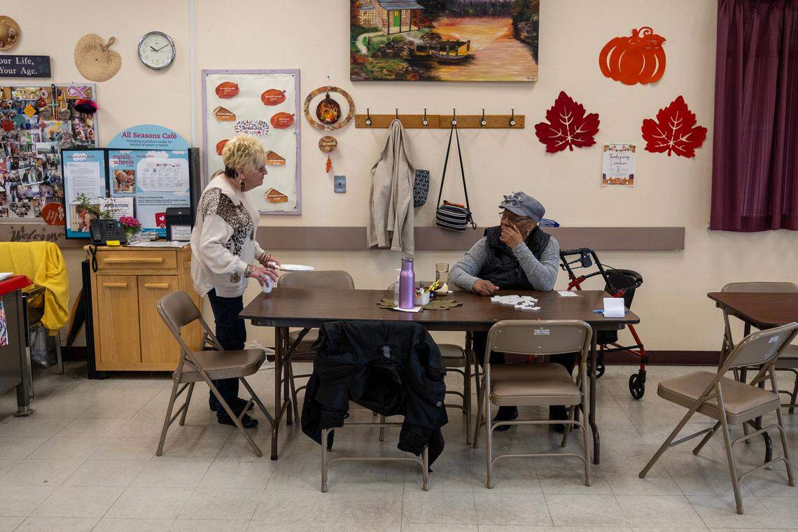 Darlene Baker, left, and Ruth Stanley, regulars at the Stanford Settlement senior center visit together earlier this month. About 50 seniors are served continental breakfast and a hot lunch every day and their existing sink is not adequate for its current use.