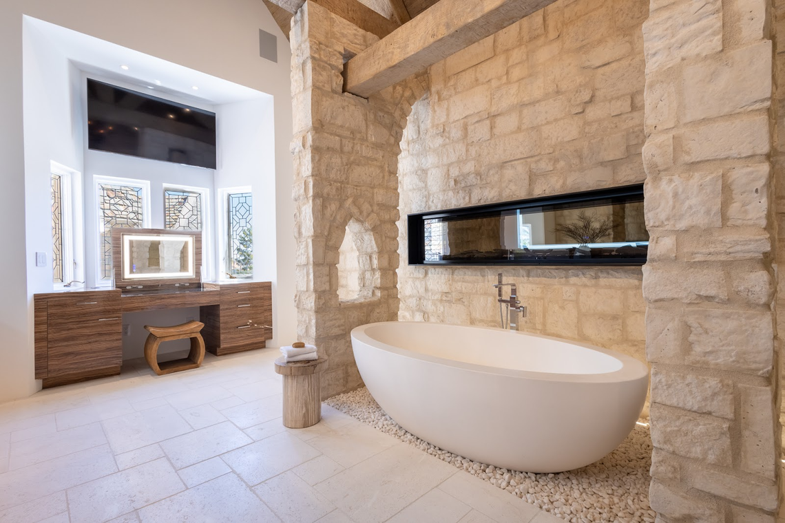 The European castle-replicated residence has five bedrooms and eight bathrooms.