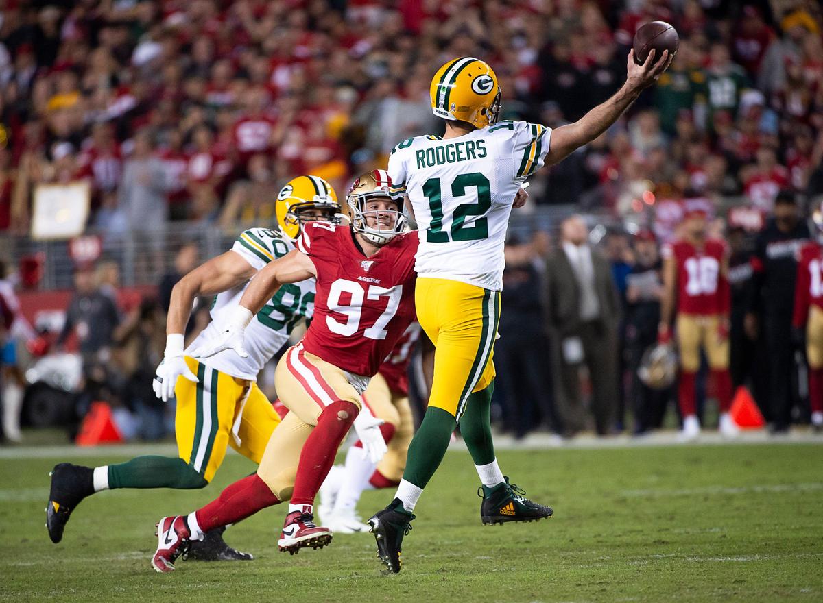 San Francisco 49ers’ Nick Bosa (97) pressures Green Bay Packers quarterback Aaron Rodgers (12) in the second quarter of the 49ers’ 37-8 victory at Levi’s Stadium on Sunday, Nov. 24, 2019 in Santa Clara.