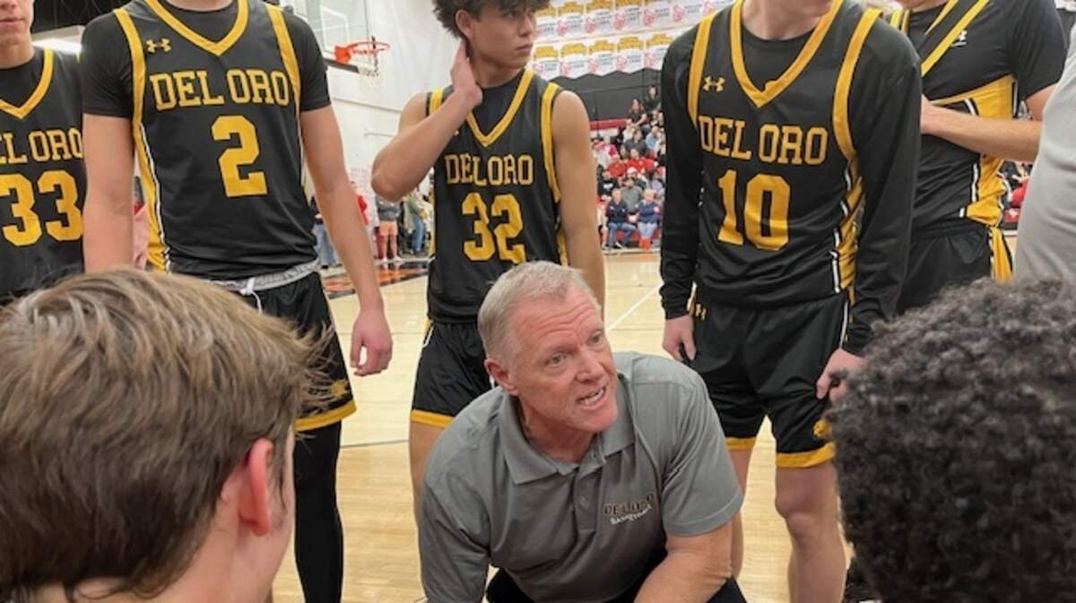 Del Oro High School boys basketball coach Geoff Broyles talks to his team during a 66-62 victory over Jesuit on Monday, Feb. 19, 2024, at Jesuit High School in Carmichael.
