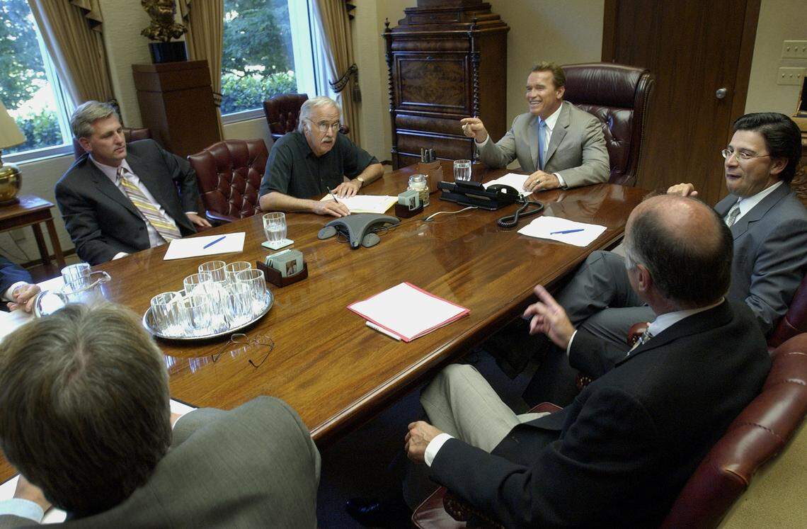 The so-called "big five" gather in the governor's offices to discuss the state budget on in June 2004. The group consisted of, clockwise from top left, Assembly GOP leader Kevin McCarthy of Bakersfield, Senate President Pro Tem John Burton of San Francisco, Gov. Arnold Schwarzenegger, Assembly Speaker Fabian Nunez of Los Angeles and Senate GOP leader Dick Ackerman of Fullerton.