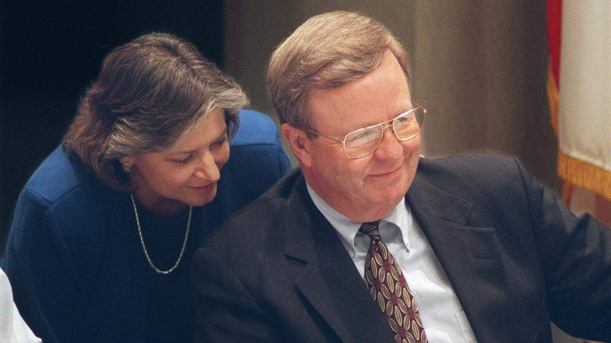 Sacramento City Manager Bill Edgar smiles at something then-Councilmember Heather Fargo passes along to him during a city hearing in 1999.