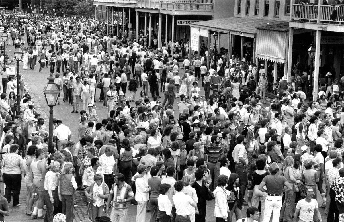 Crowds flood Old Sacramento in a historic Sacramento Bee photograph from the Center of Sacramento History's exhibit on the heyday of the Sacramento Jazz Jubilee. The exhibit will be part of the Sacramento Archives Crawl on Saturday.
