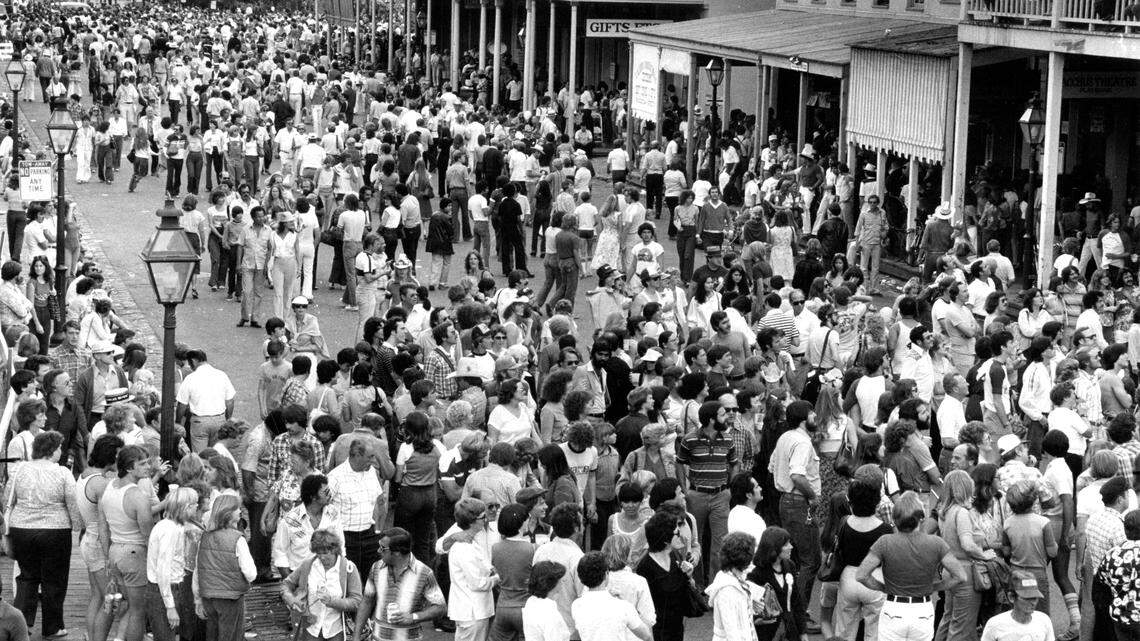 Crowds flood Old Sacramento in a historic Sacramento Bee photograph.