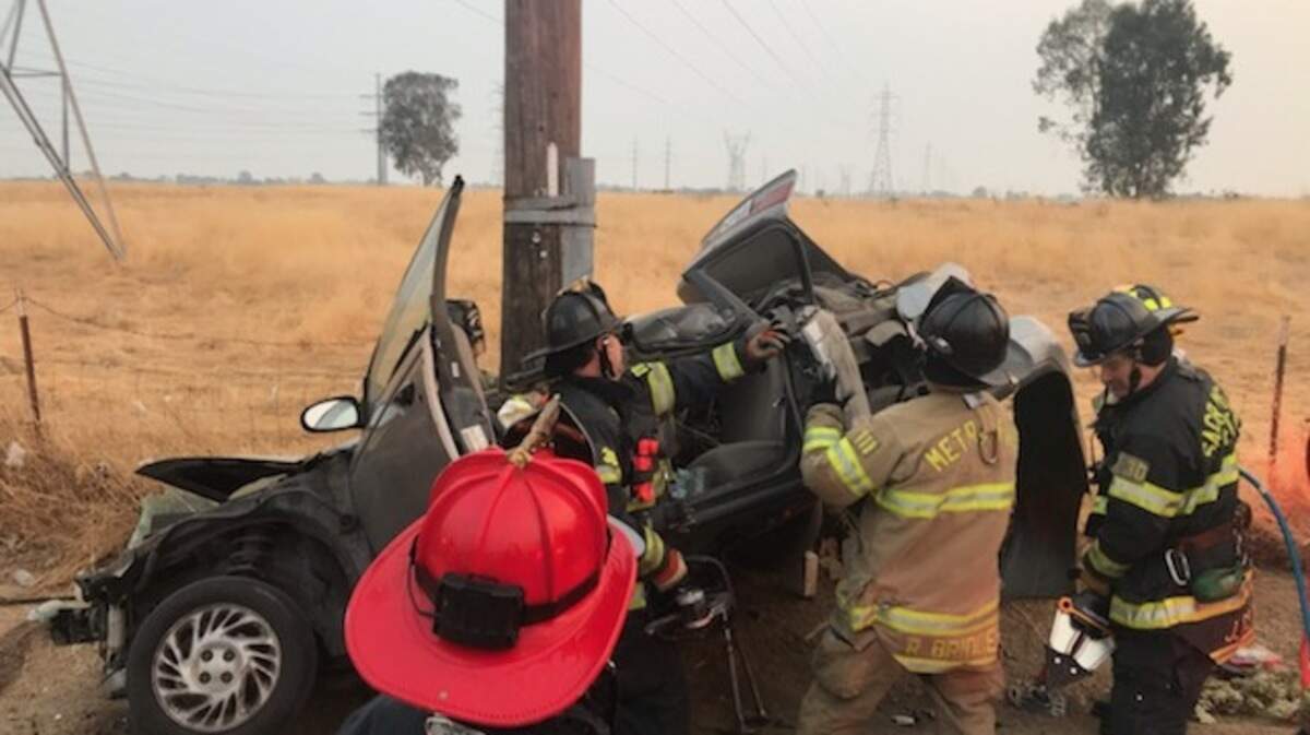 Firefighters pulled a critically-injured person from a single-vehicle collision early Monday morning.