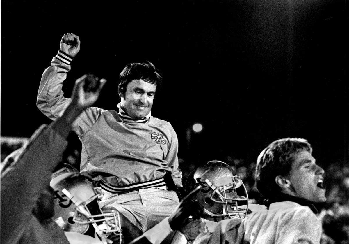 After beating UC Davis 31-28, Sacramento State coach Bob Mattos is hoisted on shoulders of players and carried onto the playing field in 1988. The Hornets ended an 18-game losing streak to UC Davis.