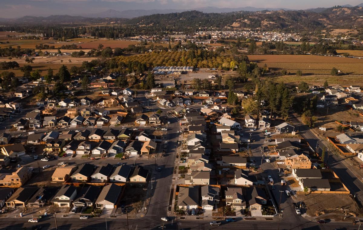 A drone photo looks north from Coffey Park, with Mocha Lane seen running up the center and the intersecting Hopper Avenue seen at bottom, on Nov. 5, 2019, in Santa Rosa. Coffey Park residents are in various stages of rebuilding and re-establishing their lives after the 2017 Tubbs Fire destroyed thousands of homes and led to five deaths in the area.