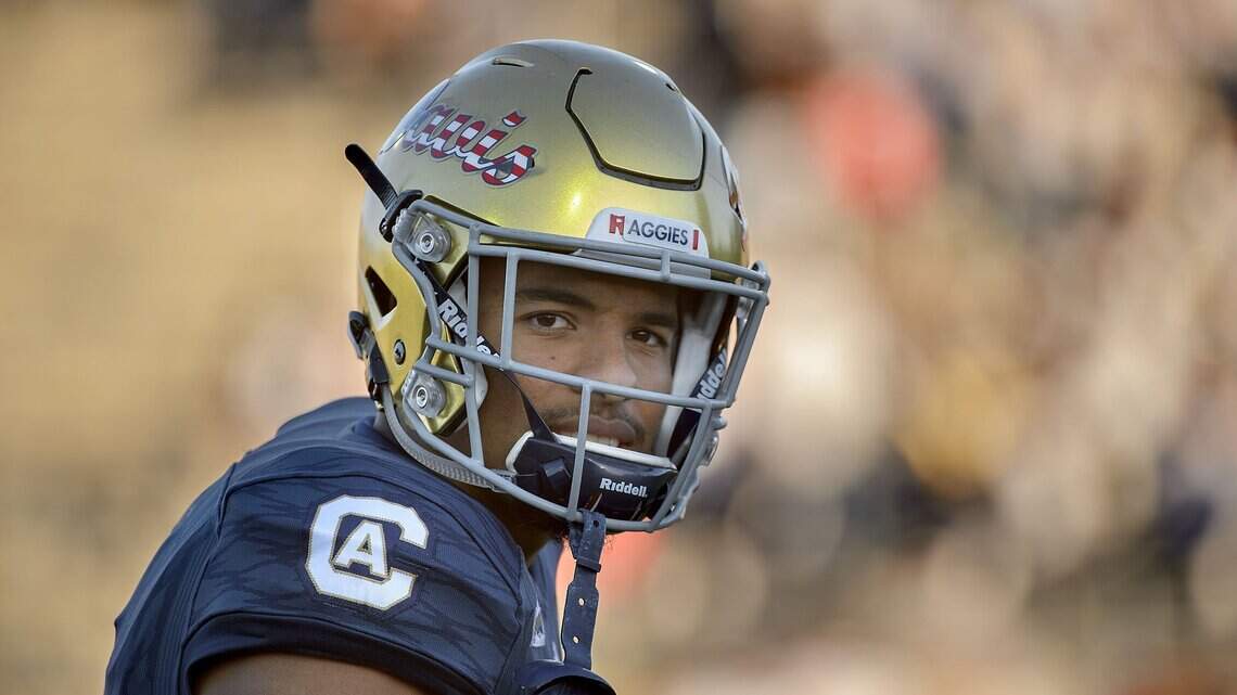 ‘Don’t throw it in the dirt’: UC Davis All-America receiver gets first pitch at A’s game