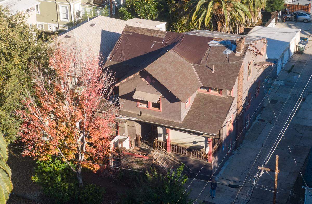 A home at 1315 22nd St. in midtown Sacramento stands vacant on Friday. The city recent sued the owners of the property, which burned in 2021. 