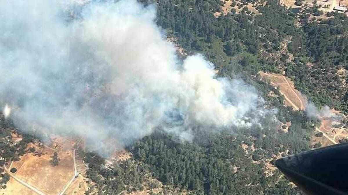 Smoke is seen from the Creek Fire, a vegetation fire that sparked Saturday, June 29, 2024, near Georgetown in El Dorado County. Evacuations for areas around Highway 193 were ordered.