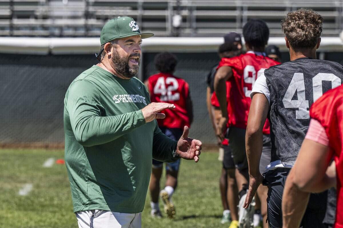 Jon Osterhout, Sacramento State's assistant athletic director and chief of staff, gives instructions to high school students participating in the Sacramento State Football Rising Stars Mega Camps on Wednesday.