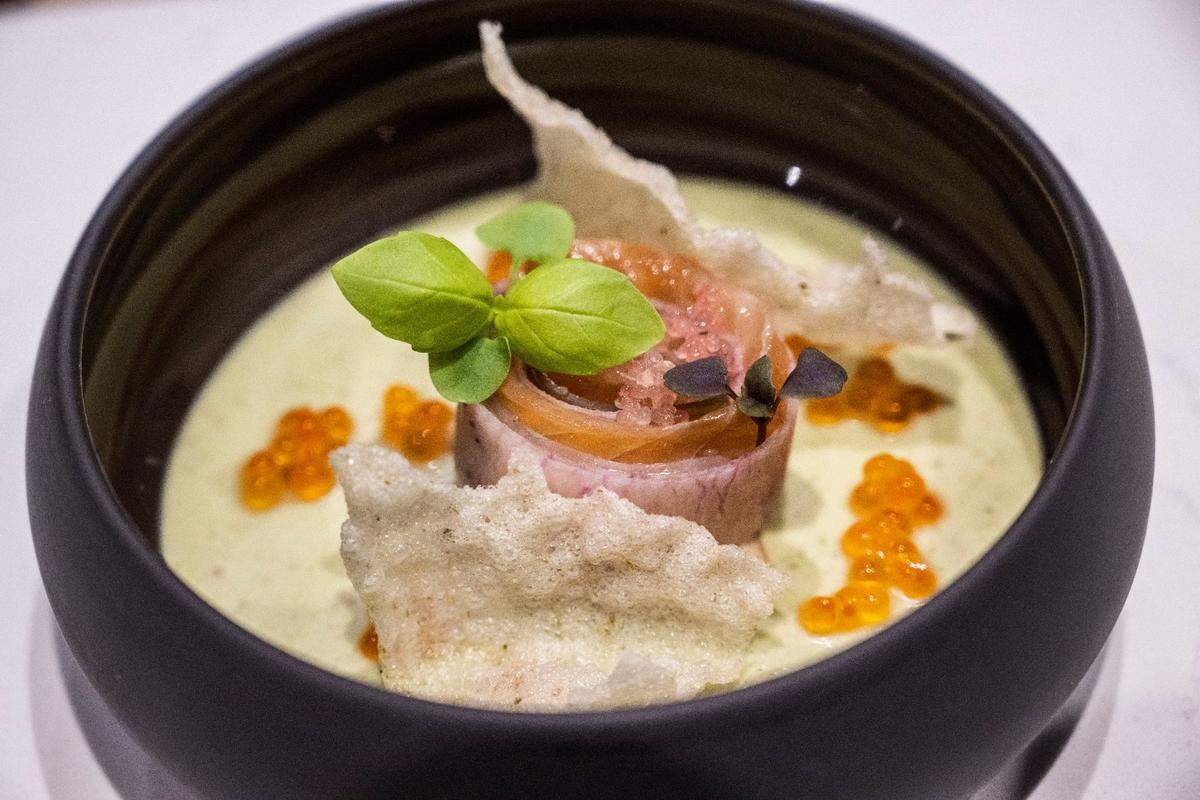 The green curry ceviche is the fourth of 12 courses on the December tasting menu. The plate includes watermelon radish, wakame seaweed, fish sauce noodles, rice crackers, trout roe and fried cashews. Its drink pairing is a riesling-based cocktail. A green curry tonic is the non-alcoholic pairing.