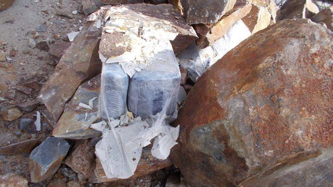 Smugglers hid 256 pounds of cocaine inside a shipment of fake decorative stones at the US-Mexico border in Tecate, California, agents say.
