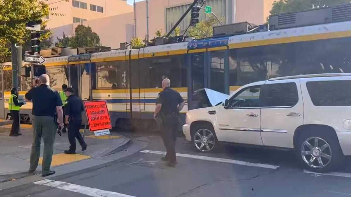 Firefighters responded to a crash between an SUV and a Sacramento Regional Transit light rail train at Eighth and N streets in Sacramento on Wednesday. Two people reported injuries in the collision.