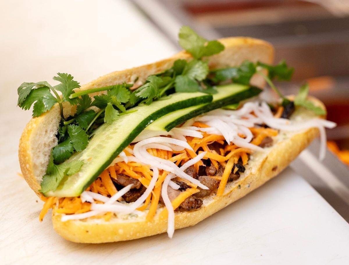 A Big Buddha sandwich with pork is ready to serve at Buddha Bowl & Rolls earlier this month.