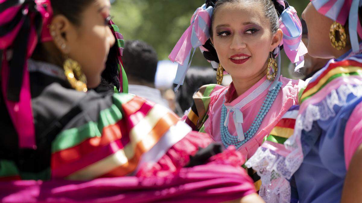 Jazmin Madrigal of Sacramento waits to perform with her group, Nostalgias de Mexico, at Fiesta En La Calle’s 50th annual Cinco de Mayo celebration in Southside Park on May 5, 2019. The free family event featured music, dancing, food a car show, kids activities and more.