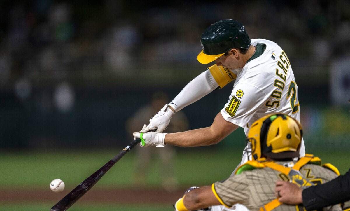 Athletics first base Tyler Soderstrom (21) hits one of his two home runs during a game against the San Diego Padres at Sutter Health Park in West Sacramento on Monday.