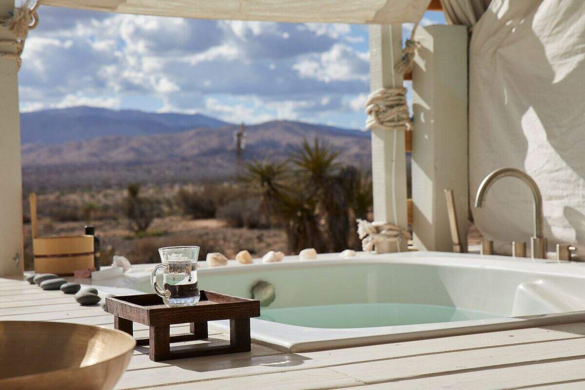 The spa looks out onto the property in the Californioa desert.