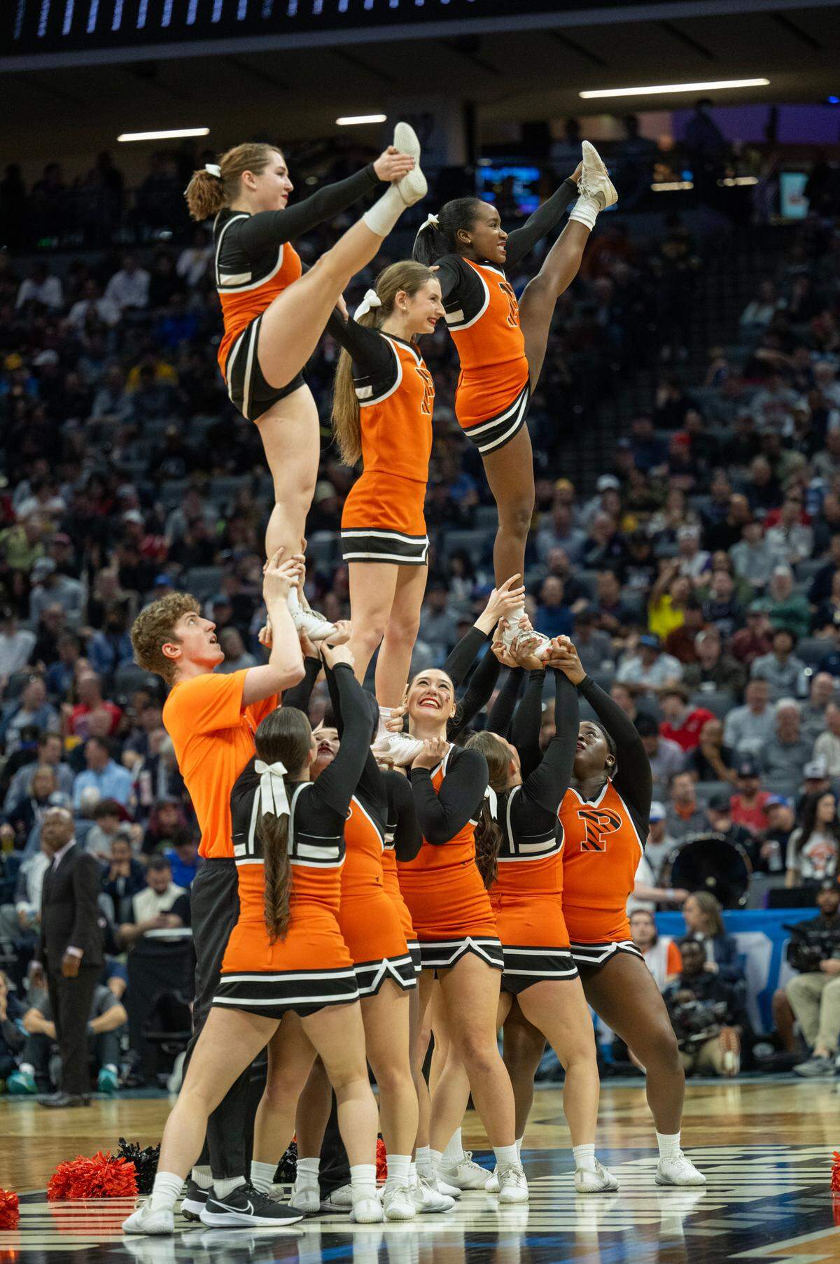 Princeton Tigers cheer squad perform during a game in the NCAA Tournament at Golden 1 Center in Sacramento on Thursday.