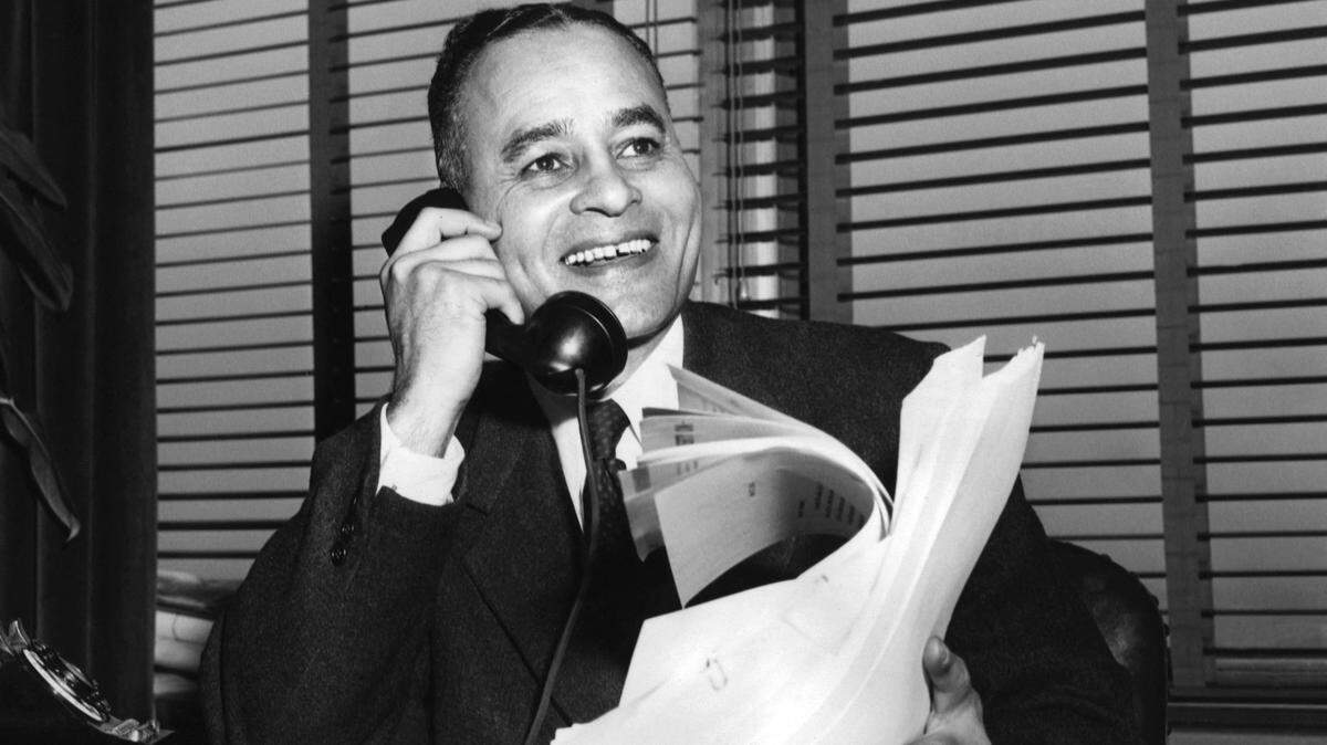 US political scientist, academic and diplomat Ralph Bunche poses at his office in New York on May 28, 1954. Ralph Johnson Bunche was an American political scientist, academic, and diplomat who received the 1950 Nobel Peace Prize for his late 1940s mediation in Israel. He was the first African American to be so honored in the history of the prize. He was involved in the formation and administration of the United Nations. In 1963, he was awarded the Presidential Medal of Freedom by President John F. Kennedy. (Photo by Frank Jurkoski / AFP) (Photo by FRANK JURKOSKI/AFP via Getty Images)