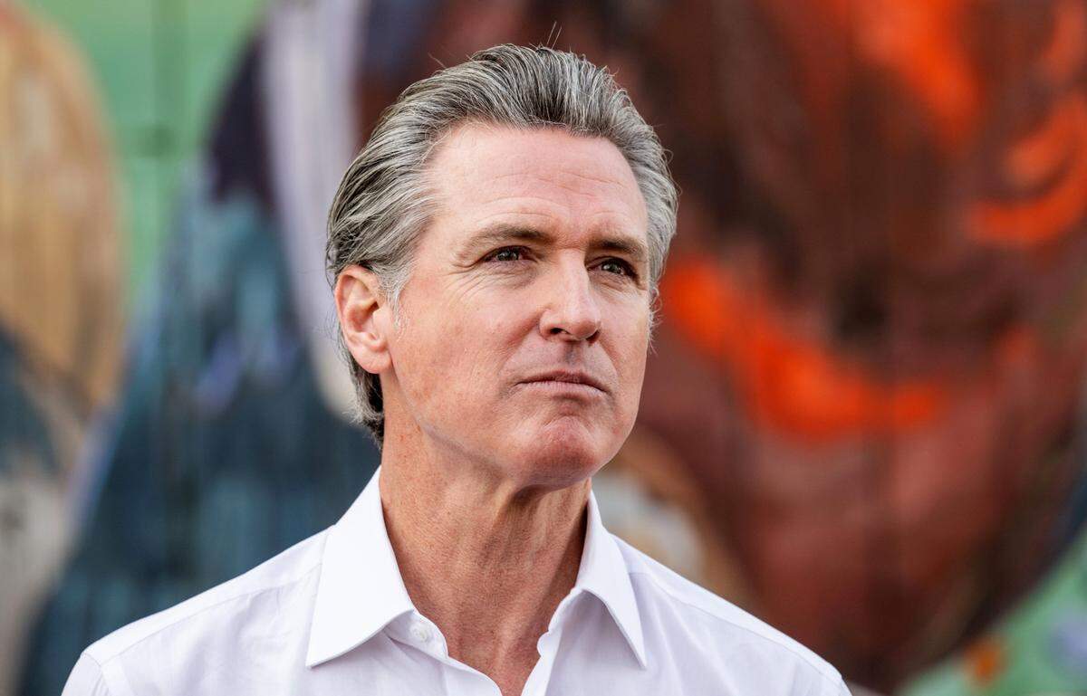 Gov. Gavin Newsom listens to a question from a reporter during a visit to Davis Ranches in Colusa County on on Tuesday, Dec. 10, 2024, where he spoke about some of the state’s major water projects like the Sites Reservoir and the Delta Conveyance tunnel project.