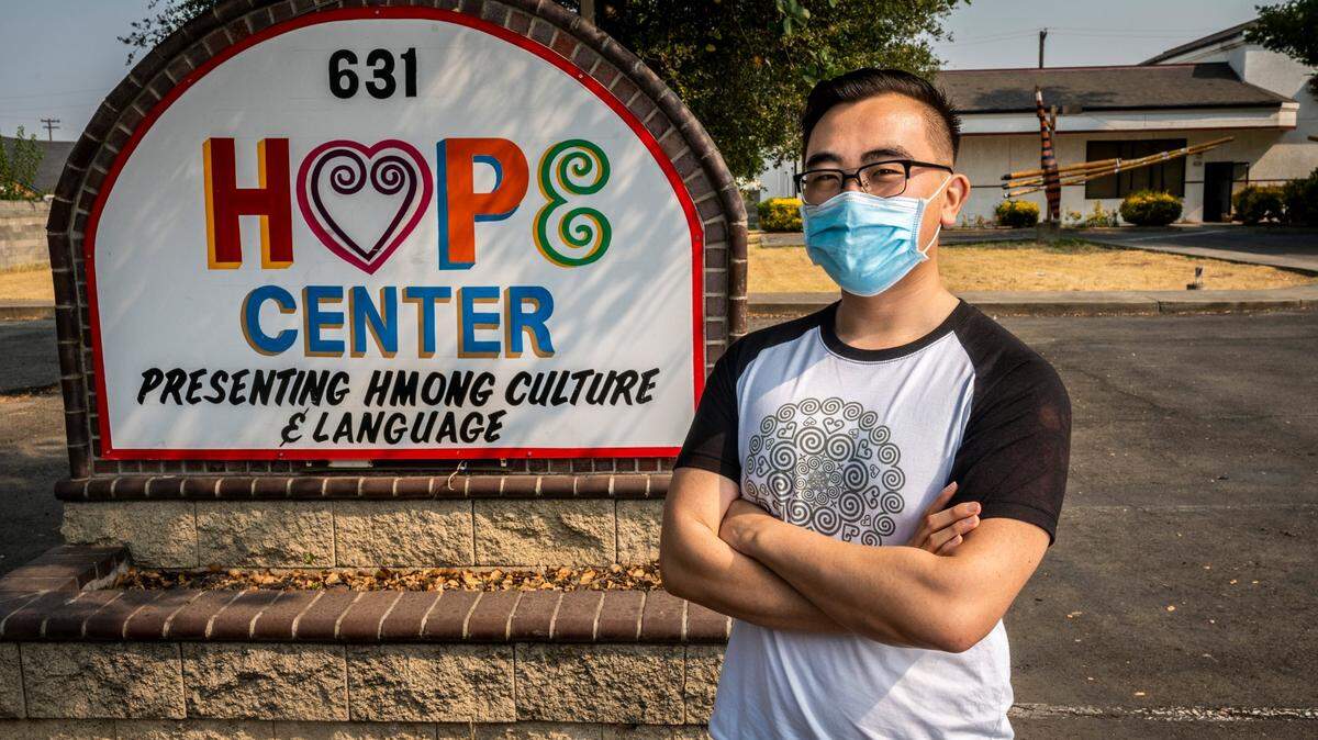 COVID-19 liaison for the Hmong community George Yang stands outside of the Hope Center in Sacramento on Sunday, Aug. 23, 2020.