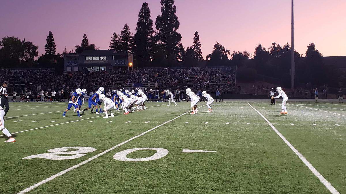 Cosumnes Oaks punts against Capital Christian during their game Friday night. Capital Christian won 32-7.